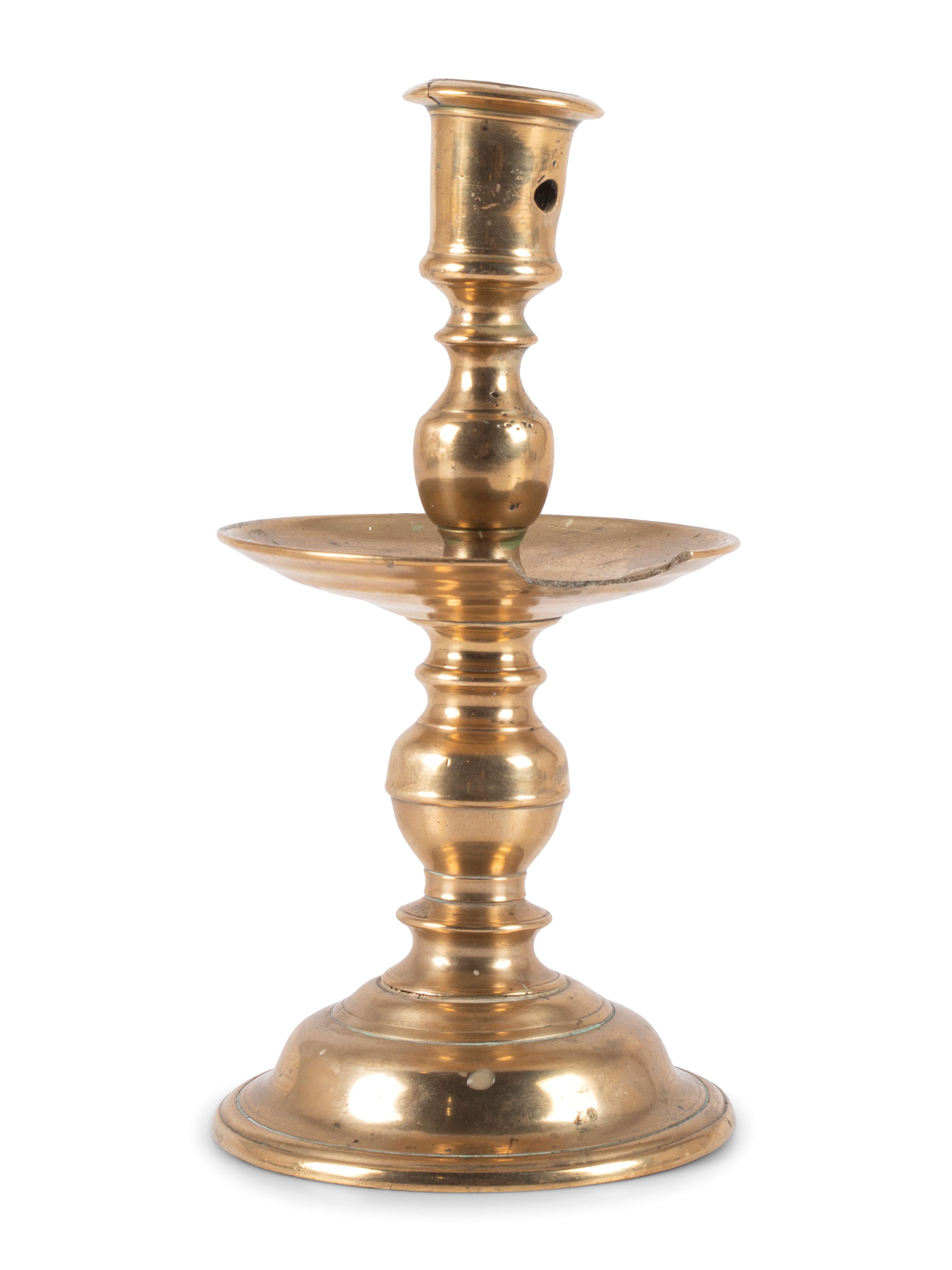 A Dutch Brass Heemskerk Candlestick