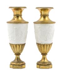 A Pair of Gilt Bronze Mounted Bisque Porcelain Vases Height 11 inches.