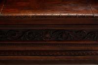 An Italian Renaissance Revival Carved Walnut Settle