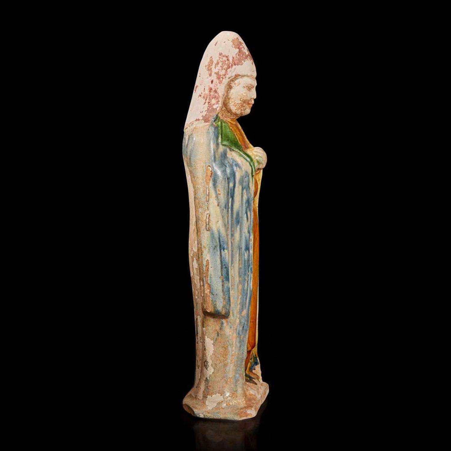 A Chinese sancai-glazed pottery attendant 三彩人物 Probably Tang dynasty ??