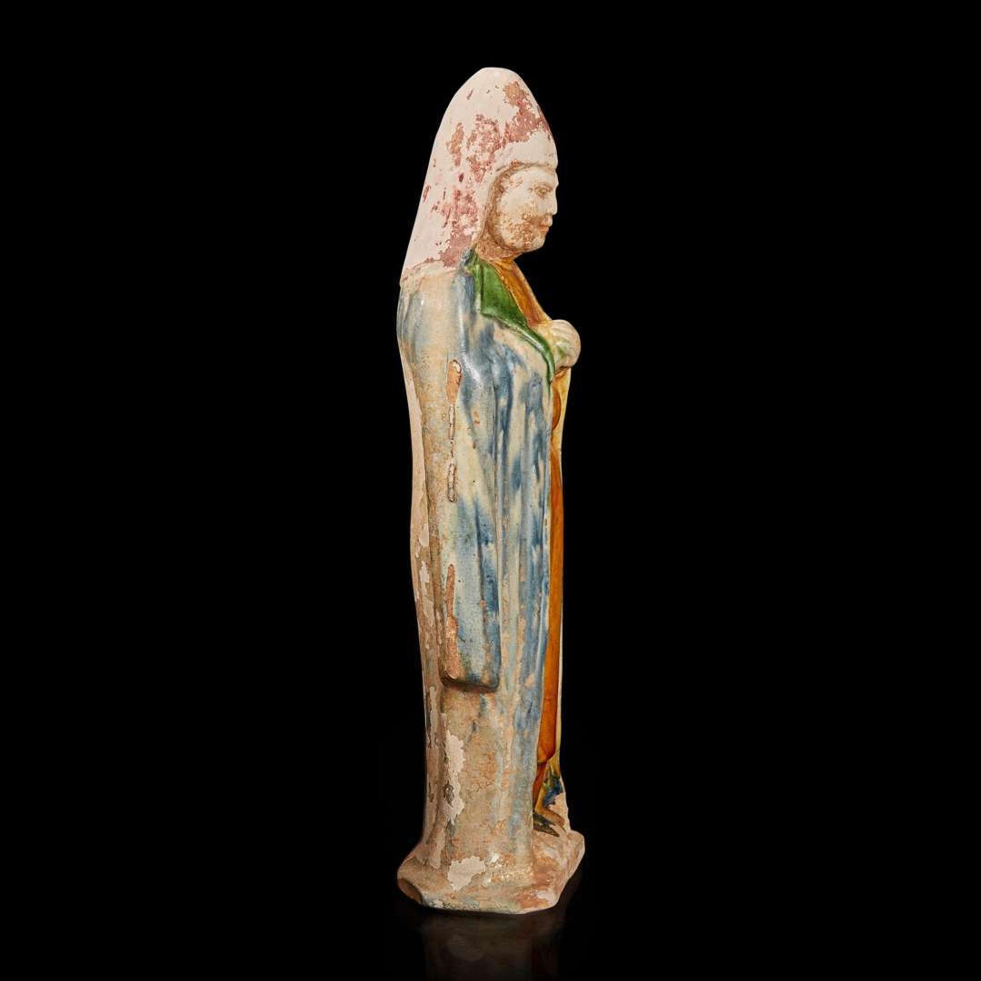 A Chinese sancai-glazed pottery attendant 三彩人物 Probably Tang dynasty ??