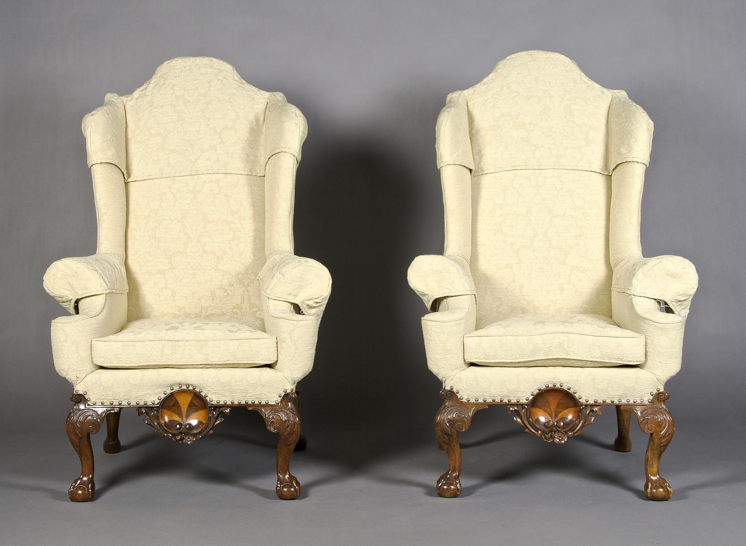 A Pair of George II Style Wingback Armchairs, Height 54 inches.
