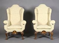 A Pair of George II Style Wingback Armchairs, Height 54 inches.