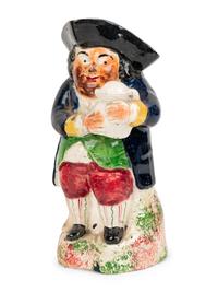 A Dr. Johnson Toby Jug and Two Other Toby Jugs