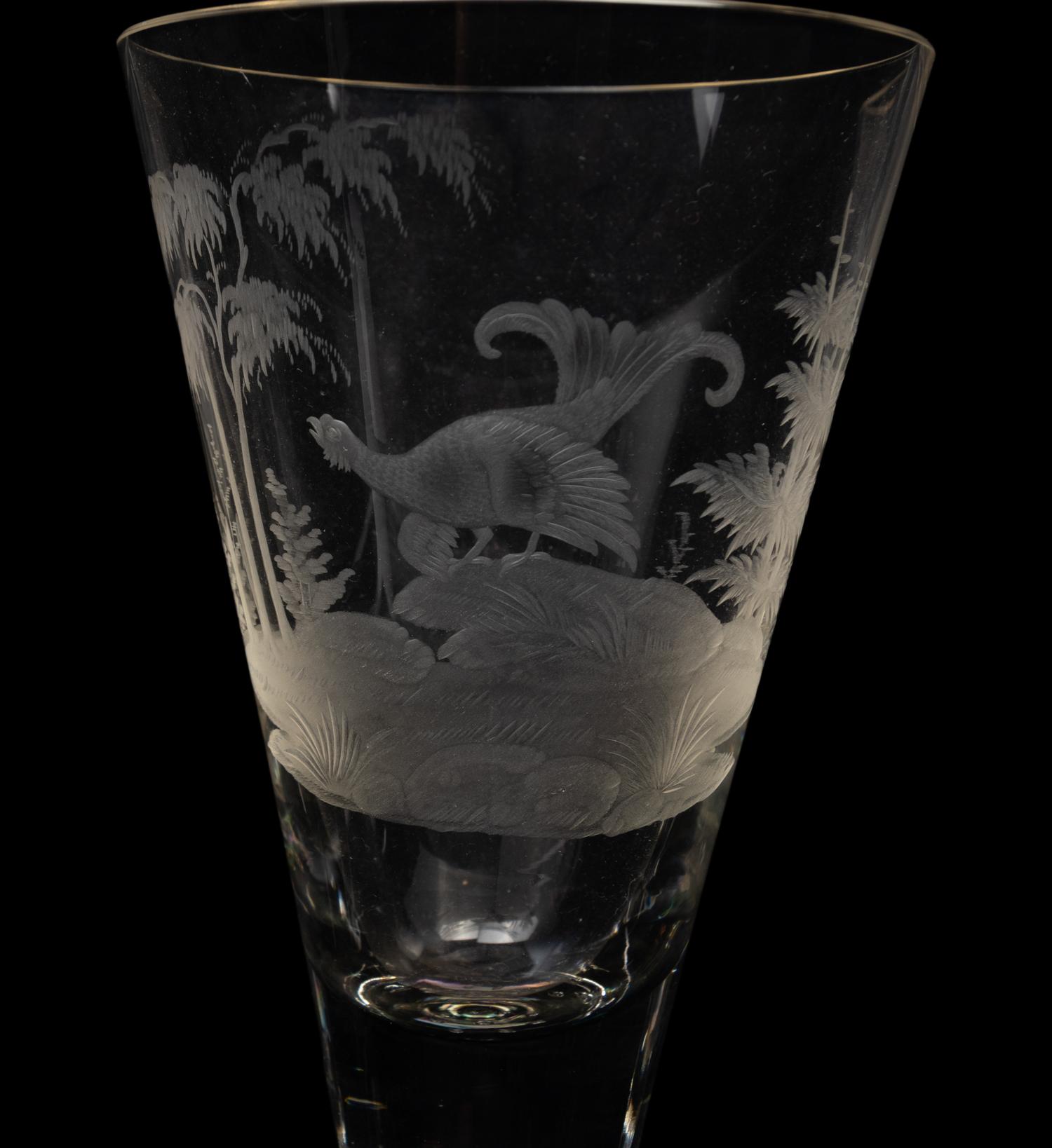 A Set of Four Large Etched Glass Wine Stems