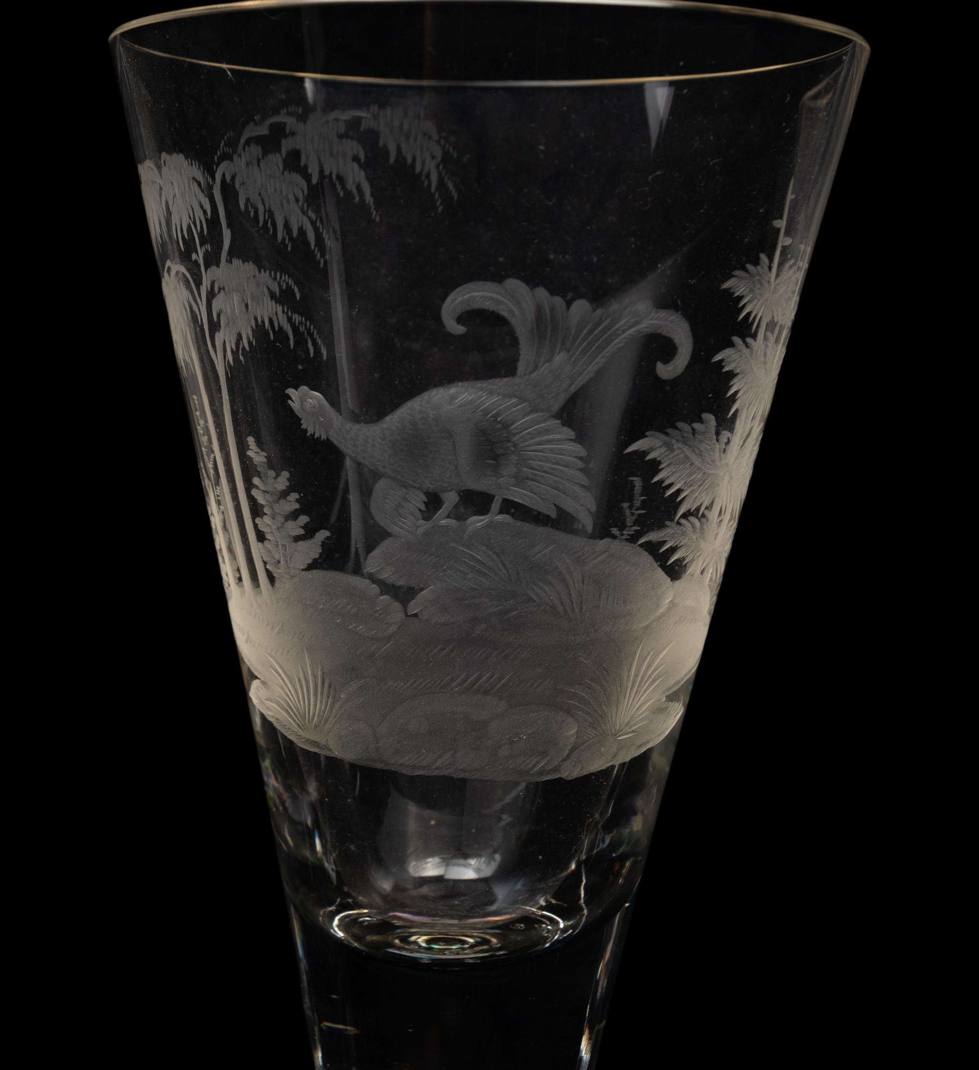 A Set of Four Large Etched Glass Wine Stems