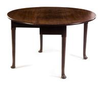 An English Oak Double Drop-Leaf Table Height 28 x width 16 1/2 x depth 48 inches. — 19TH CENTURY OR EARLIER