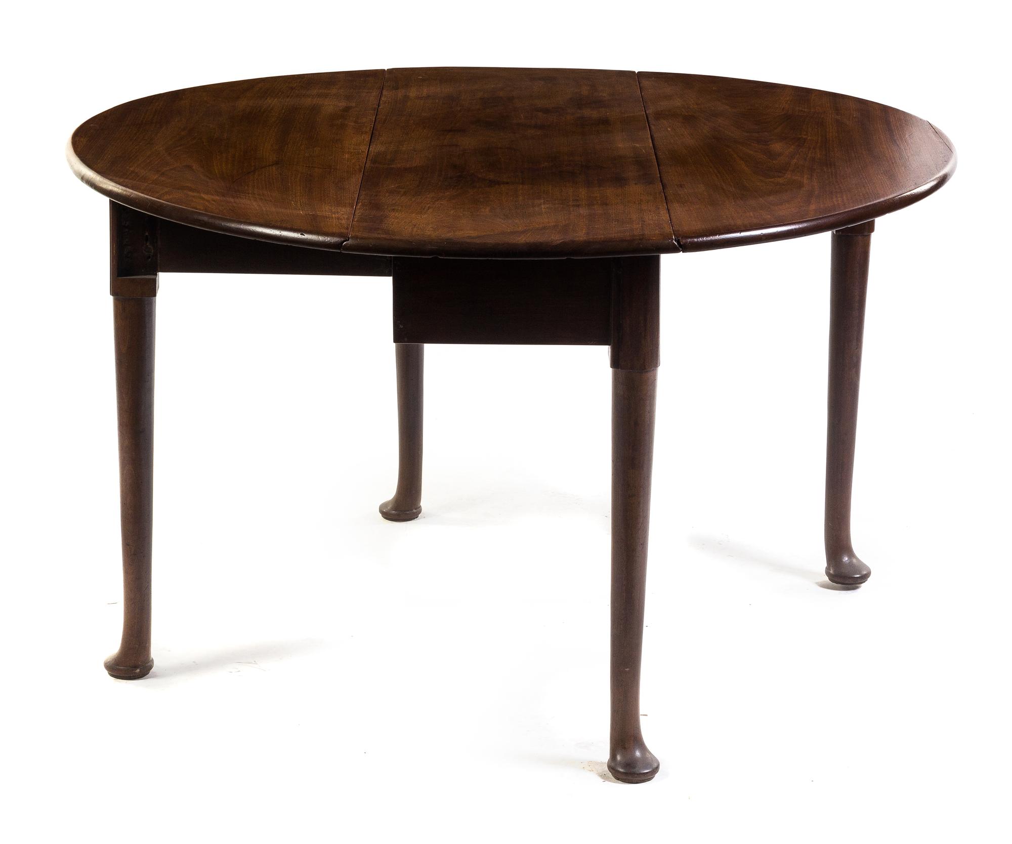 An English Oak Double Drop-Leaf Table Height 28 x width 16 1/2 x depth 48 inches. — 19TH CENTURY OR EARLIER