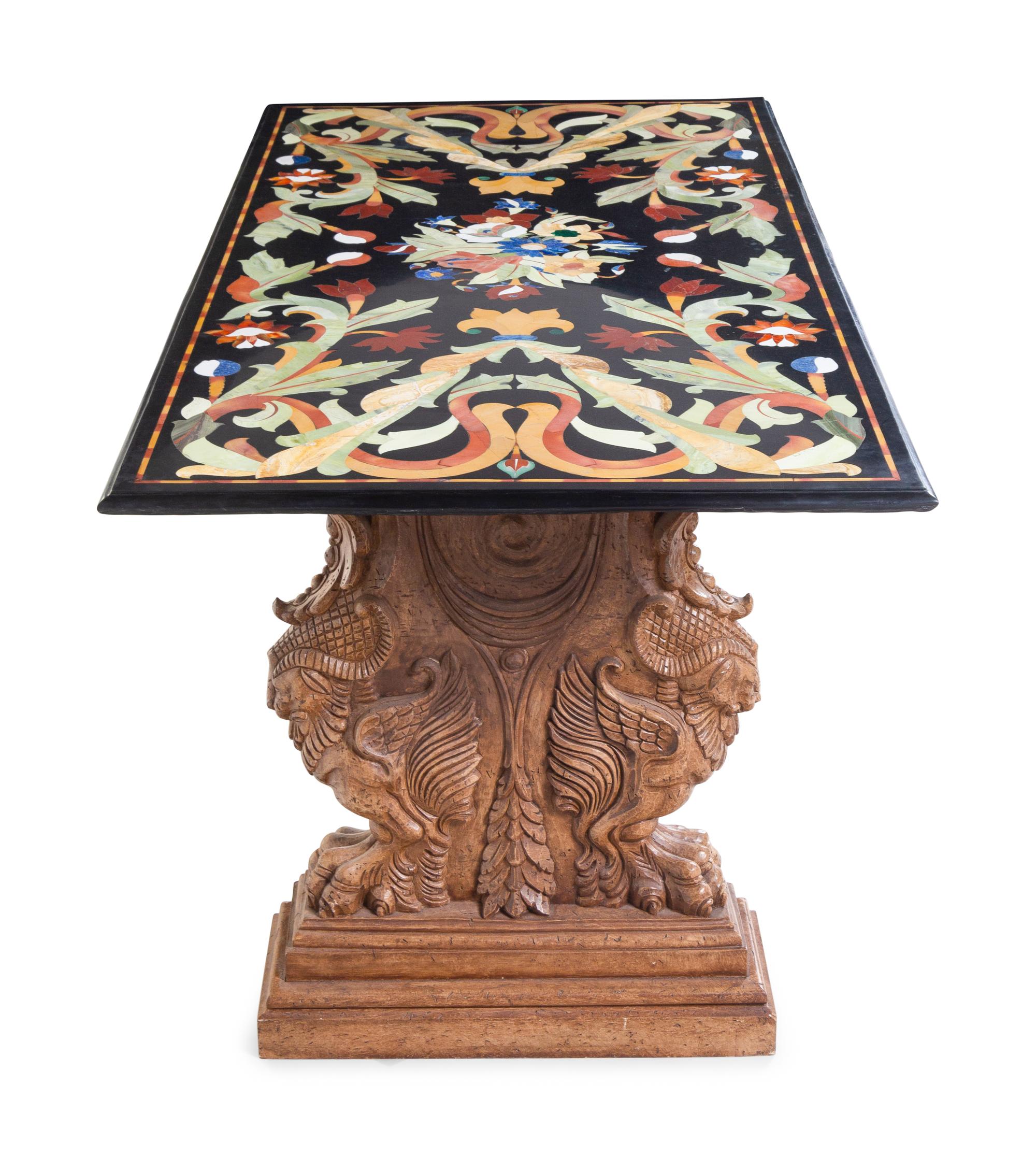 An Indian Pietra Dura Tabletop on an Associated Pair of Renaissance Revival Trestles