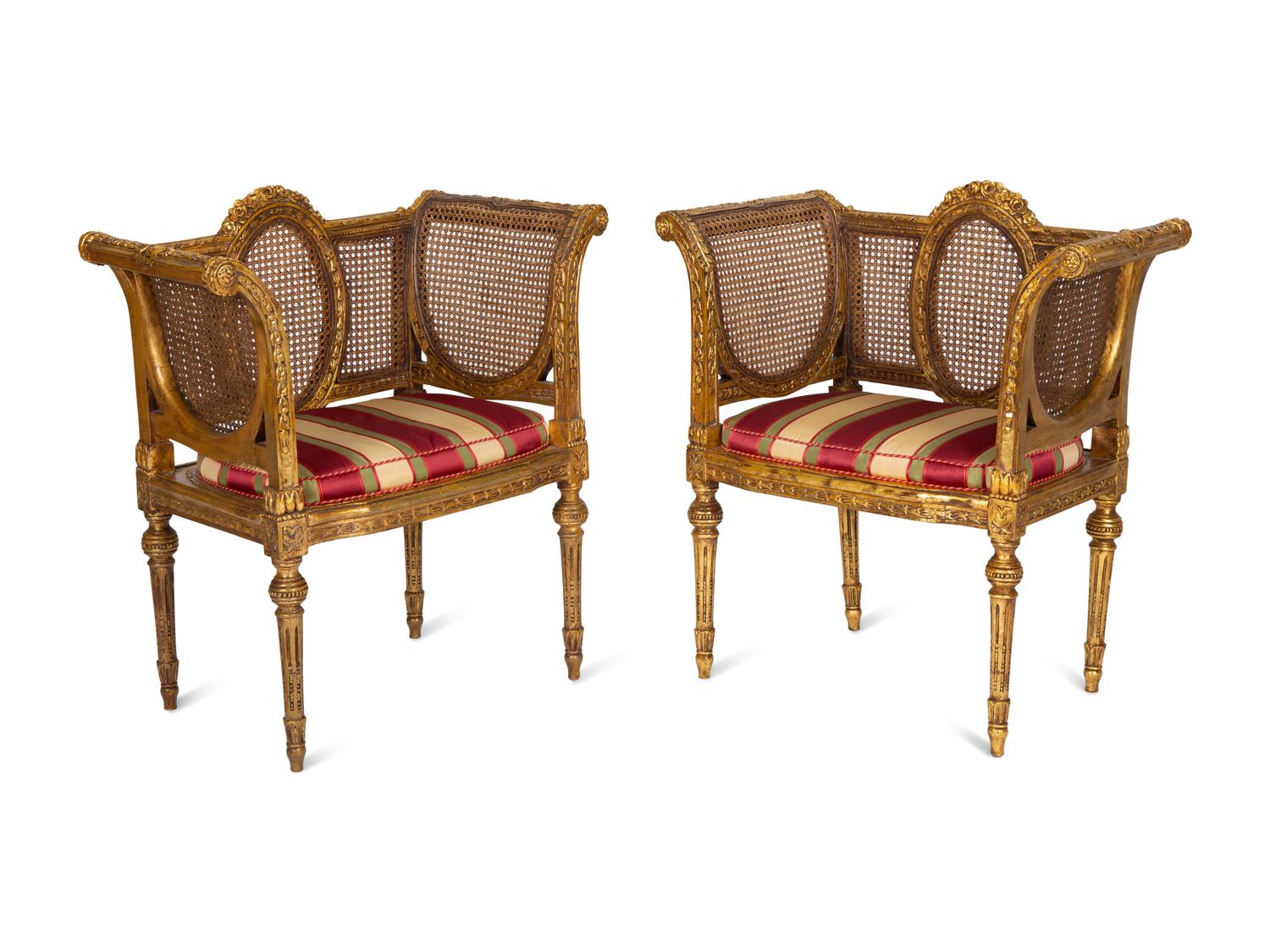 A Pair of Louis XVI Style Giltwood Cane-Back Benches