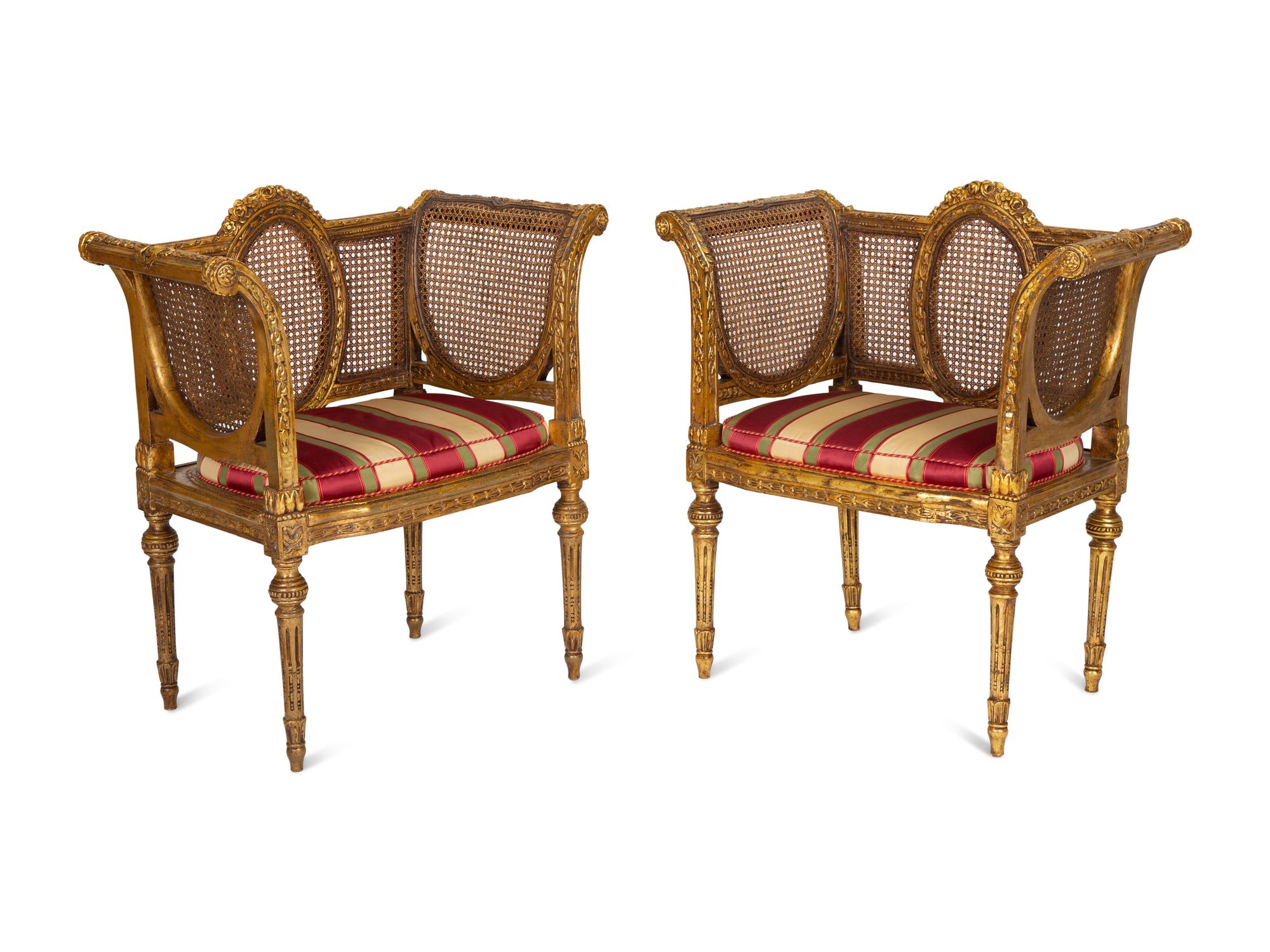 A Pair of Louis XVI Style Giltwood Cane-Back Benches
