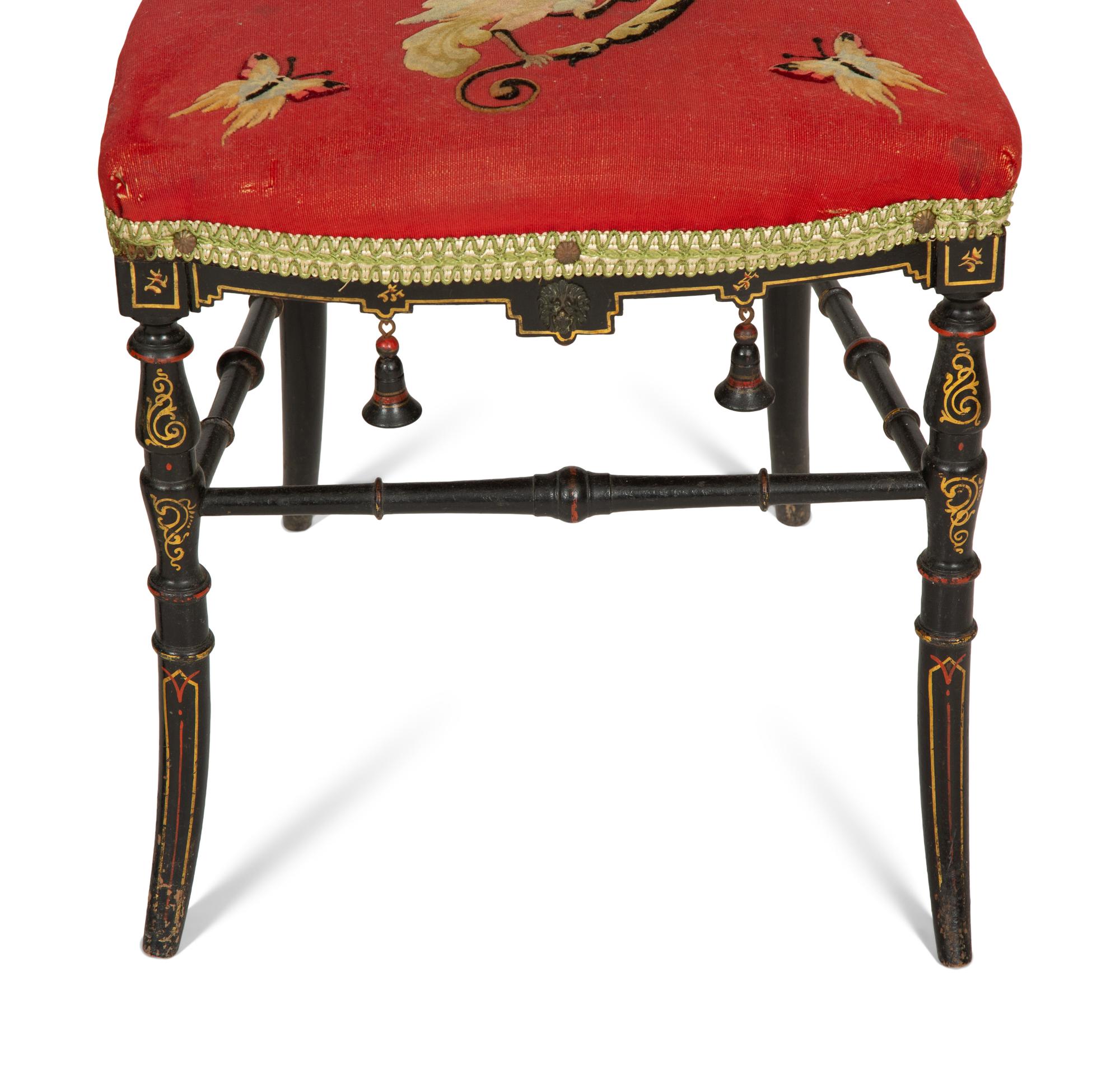 A Set of Four Black and Polychrome Chinoiserie-Decorated Chairs