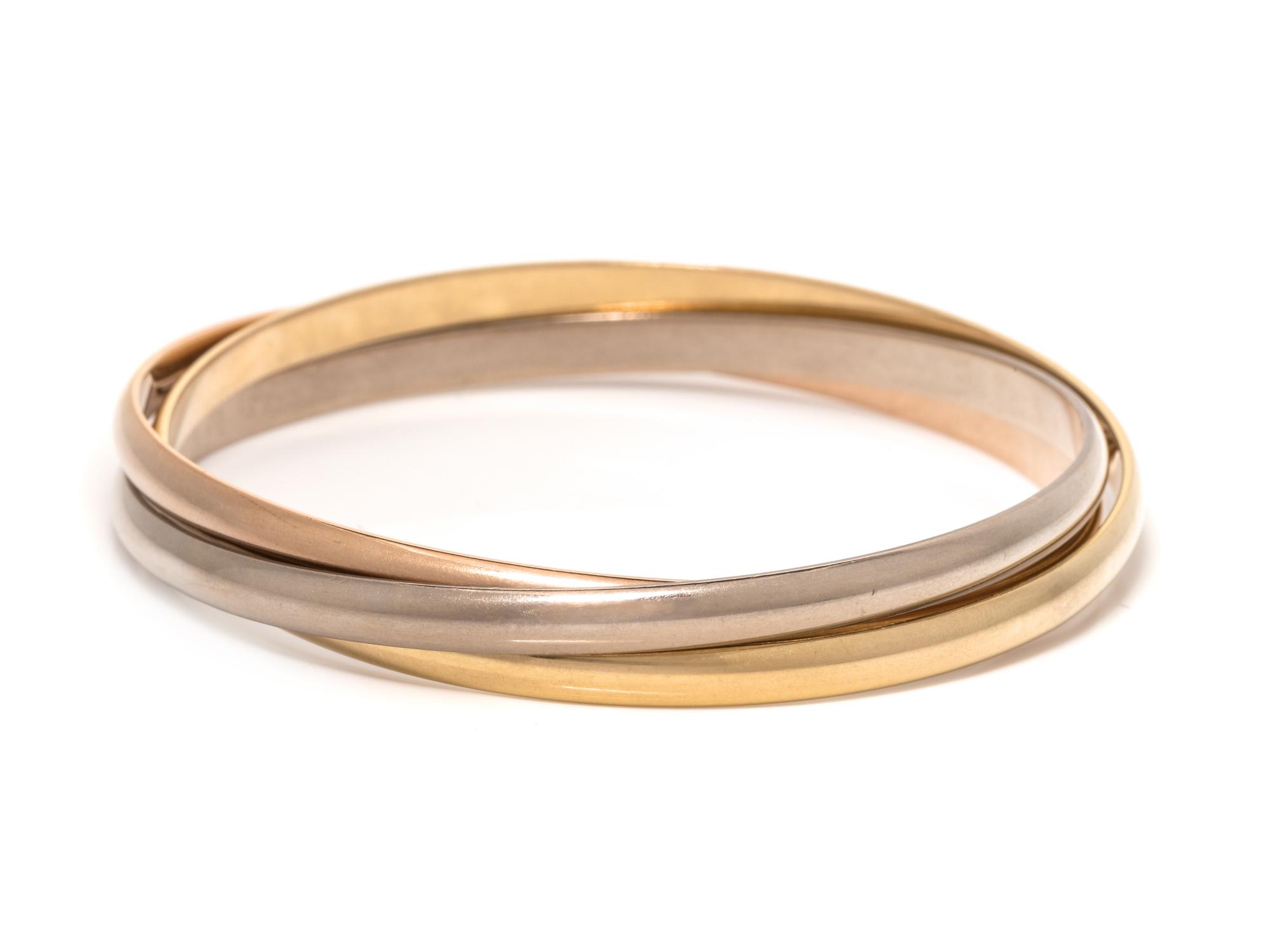 CARTIER, TRICOLOR GOLD 'TRINITY' BANGLE BRACELET