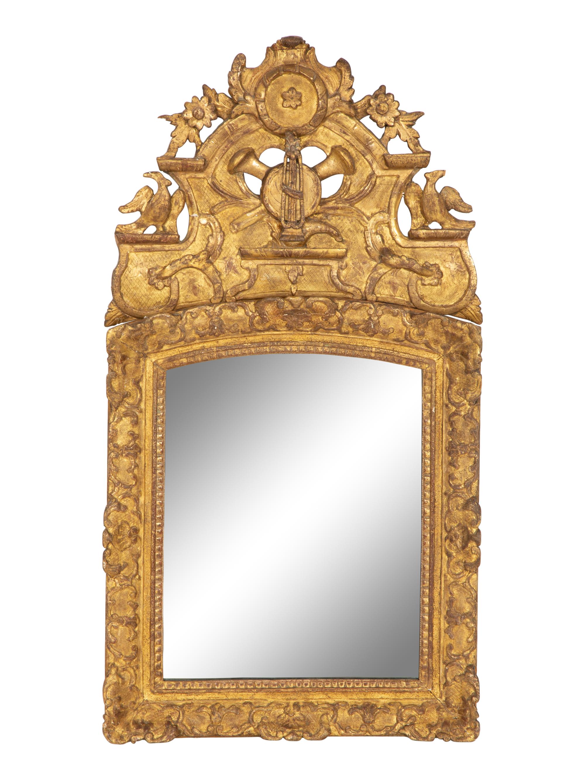 A Continental Carved Giltwood Wall Mirror