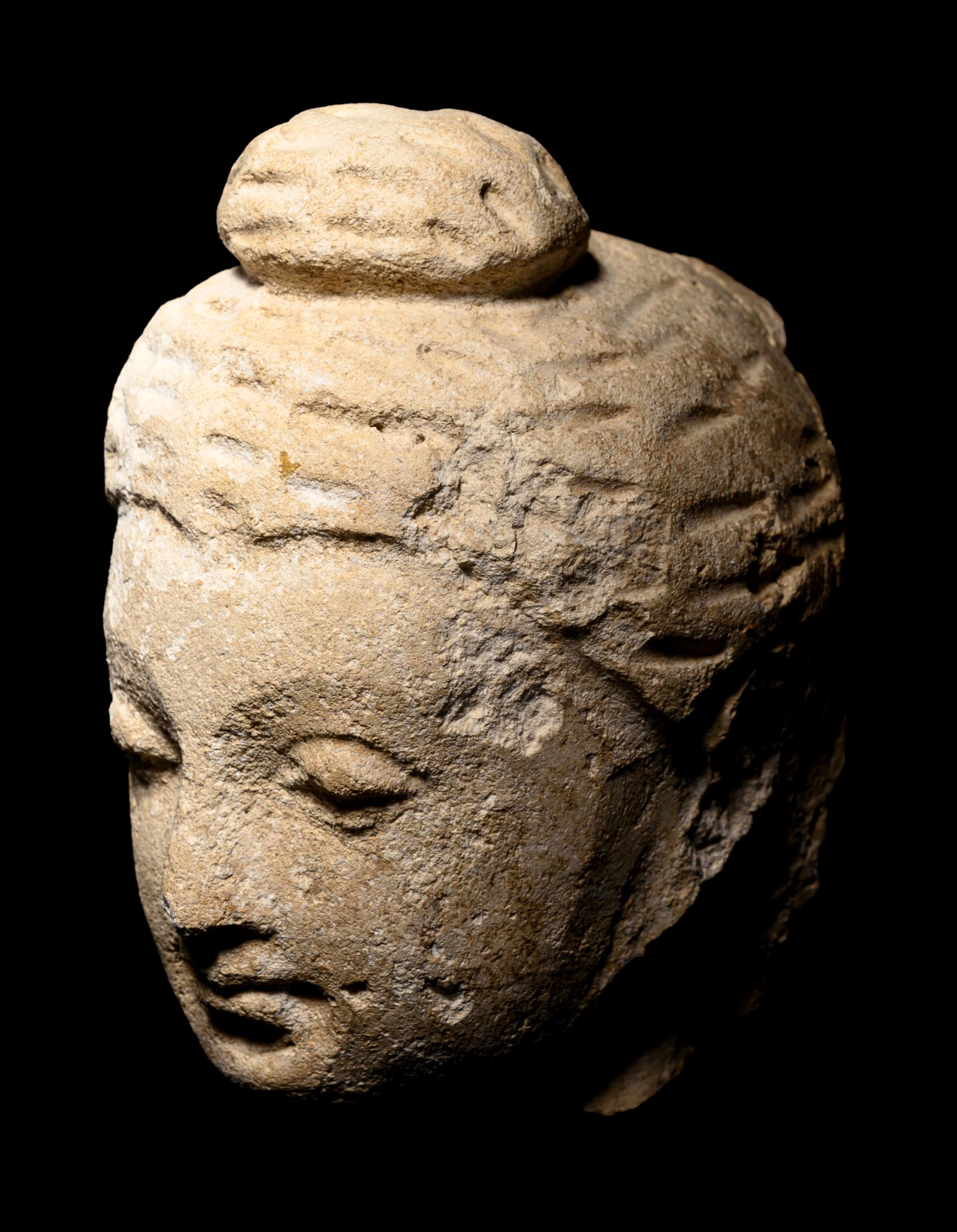 Three Gandharan Fragmentary Stucco Heads and One European Fragmentary Stucco Head