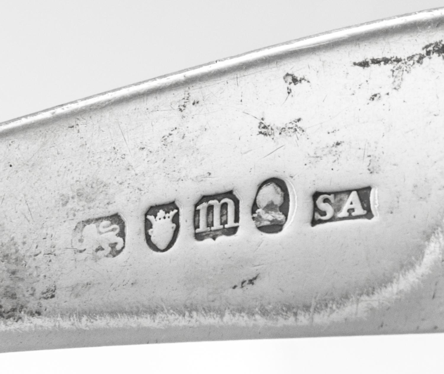 A Group of Four George III Silver Flatware Articles, Various Makers, comprising a serving spoon, Stephen Adams, London, 1787; sugar ton
