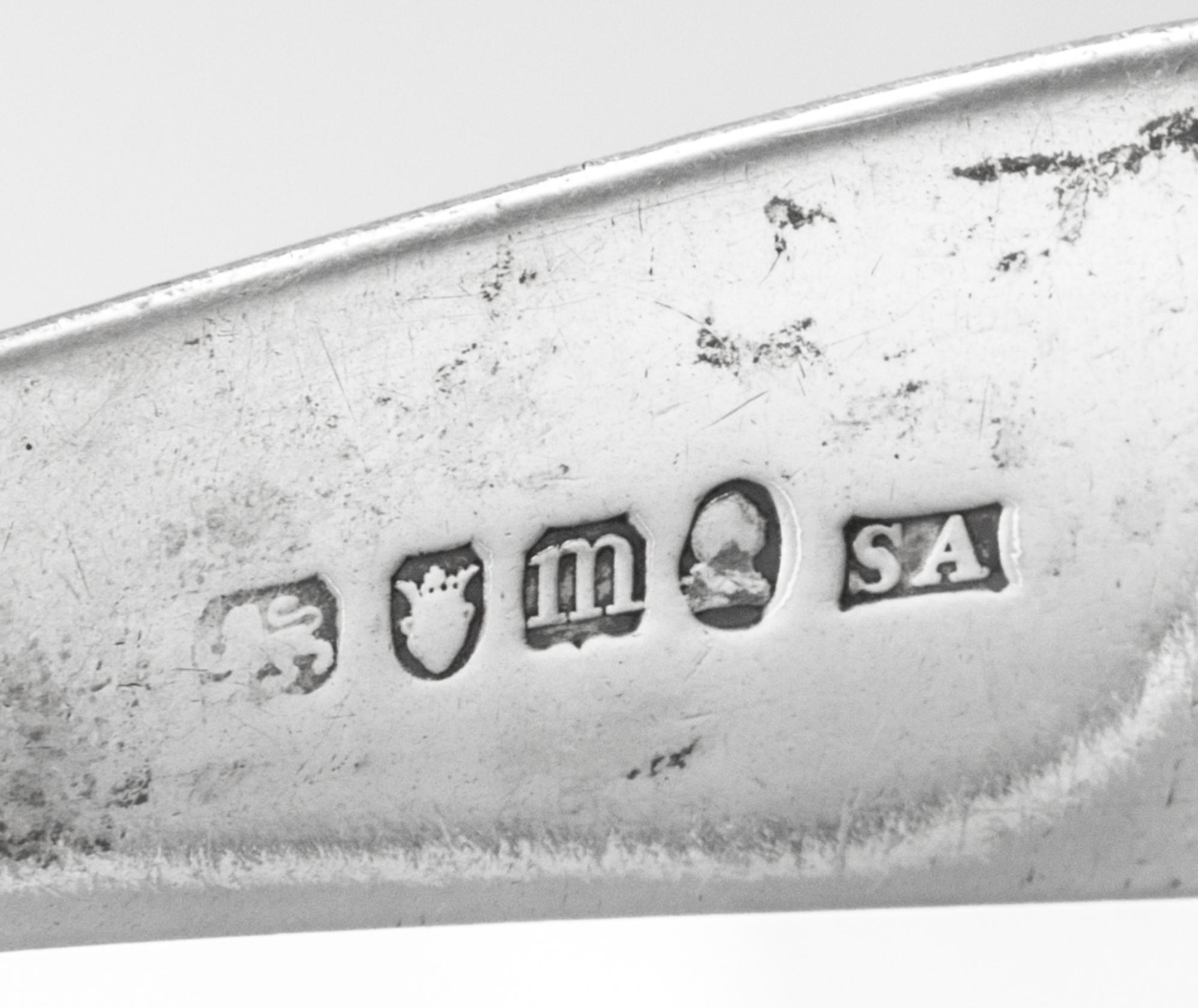 A Group of Four George III Silver Flatware Articles, Various Makers, comprising a serving spoon, Stephen Adams, London, 1787; sugar ton