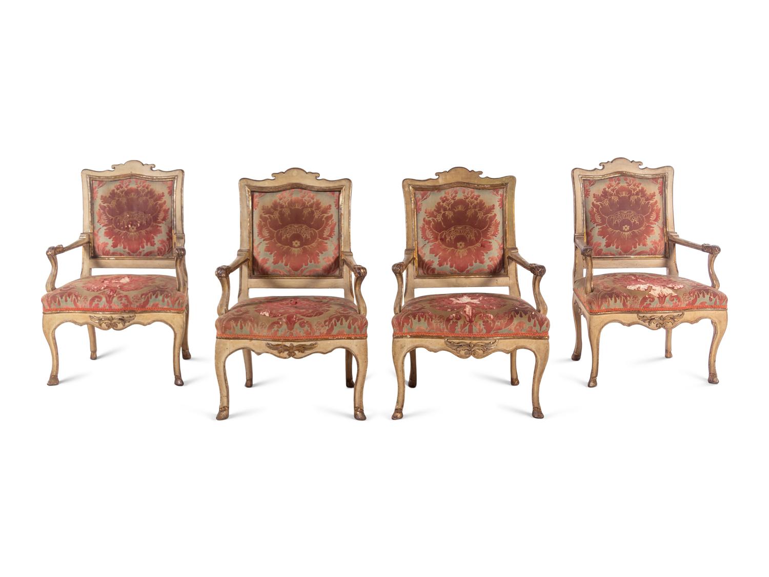 A Set of Four Italian Cream-Painted and Parcel Gilt Armchairs
