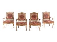 A Set of Four Italian Cream-Painted and Parcel Gilt Armchairs