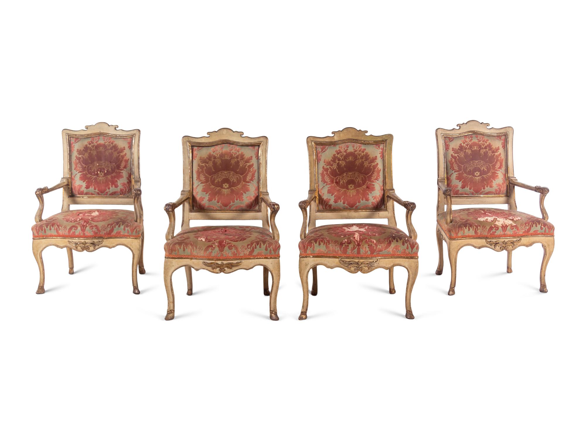 A Set of Four Italian Cream-Painted and Parcel Gilt Armchairs