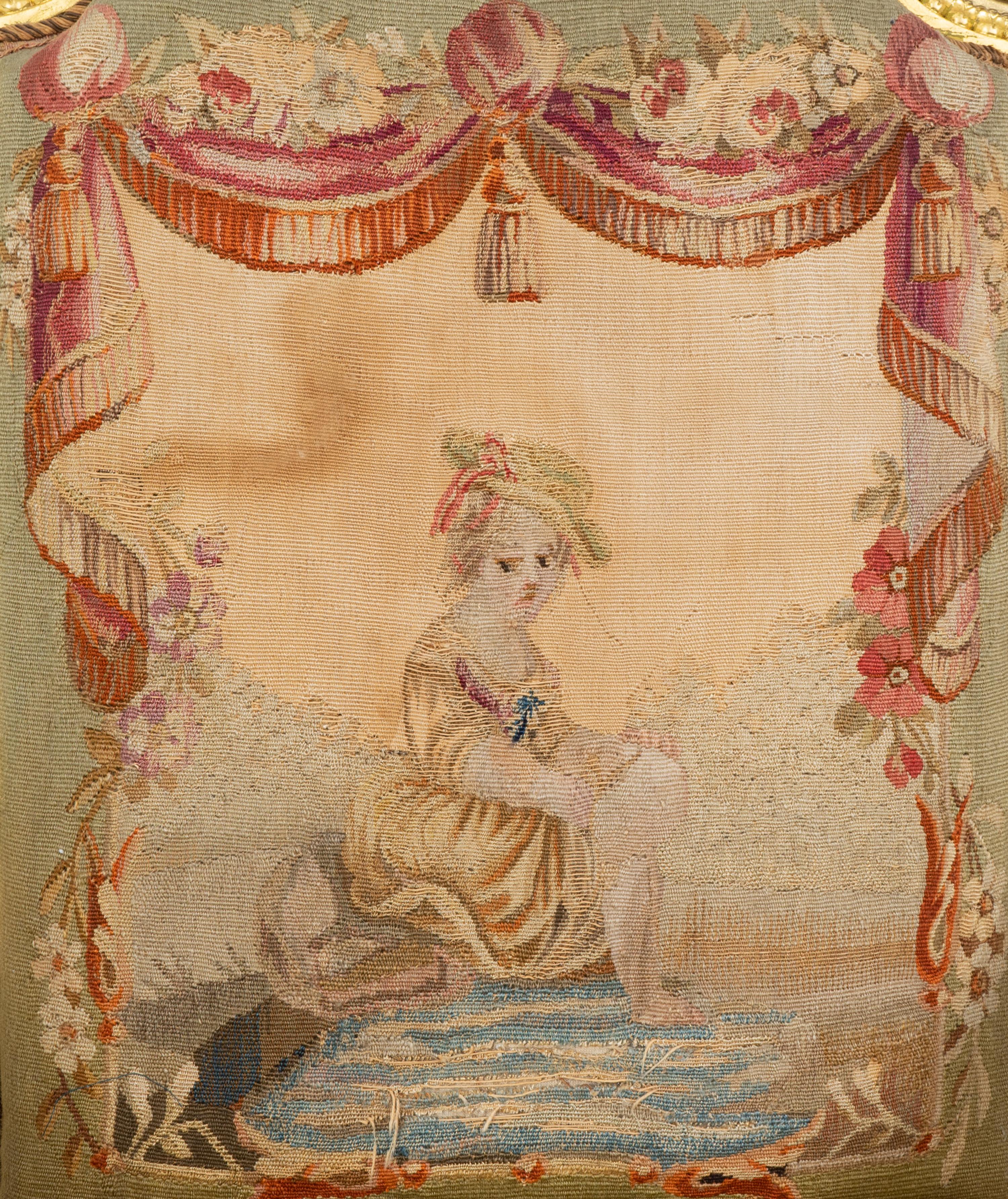 A Set of Four Louis XVI Style Giltwood Fauteuils with Tapestry Upholstery — 19TH CENTURY