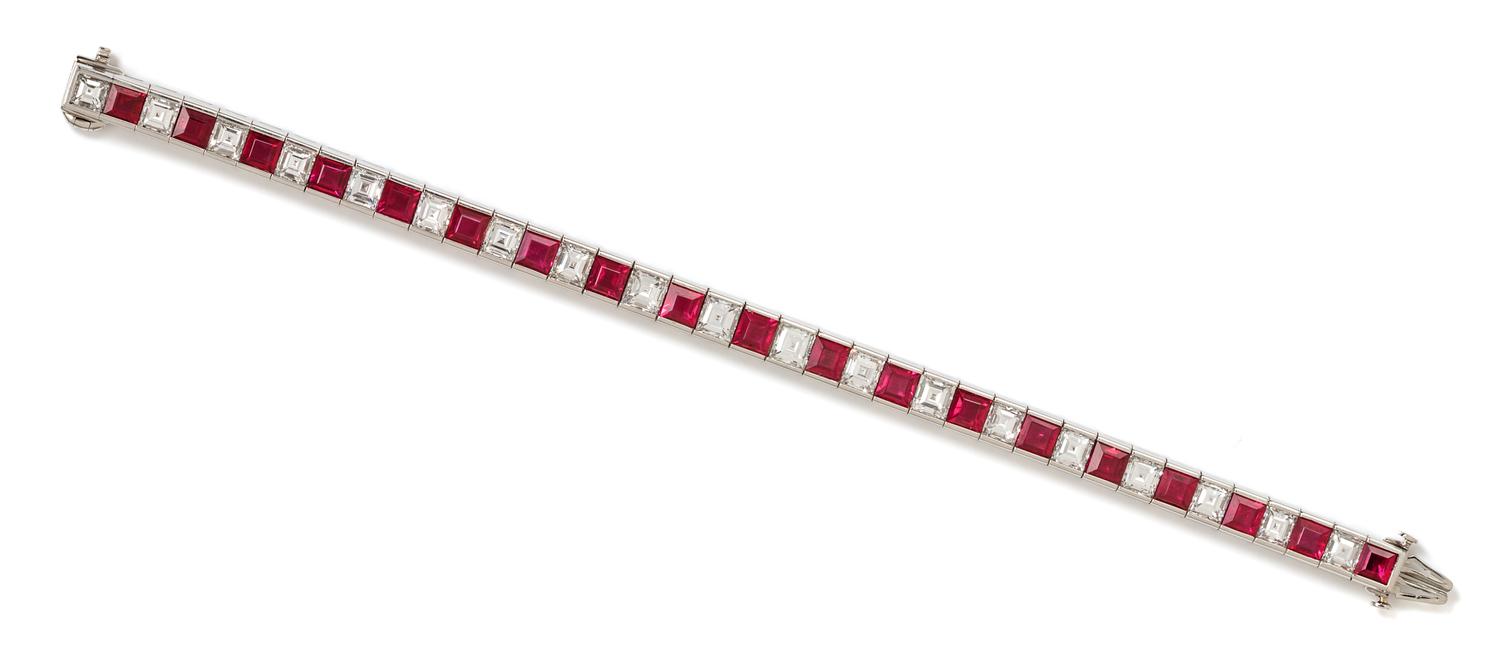 A Platinum, Ruby and Diamond Line Bracelet, 22.65 dwts.