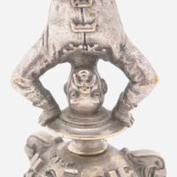 Two French silver figural bells One marked Fannière Frères, Paris, late 19th century