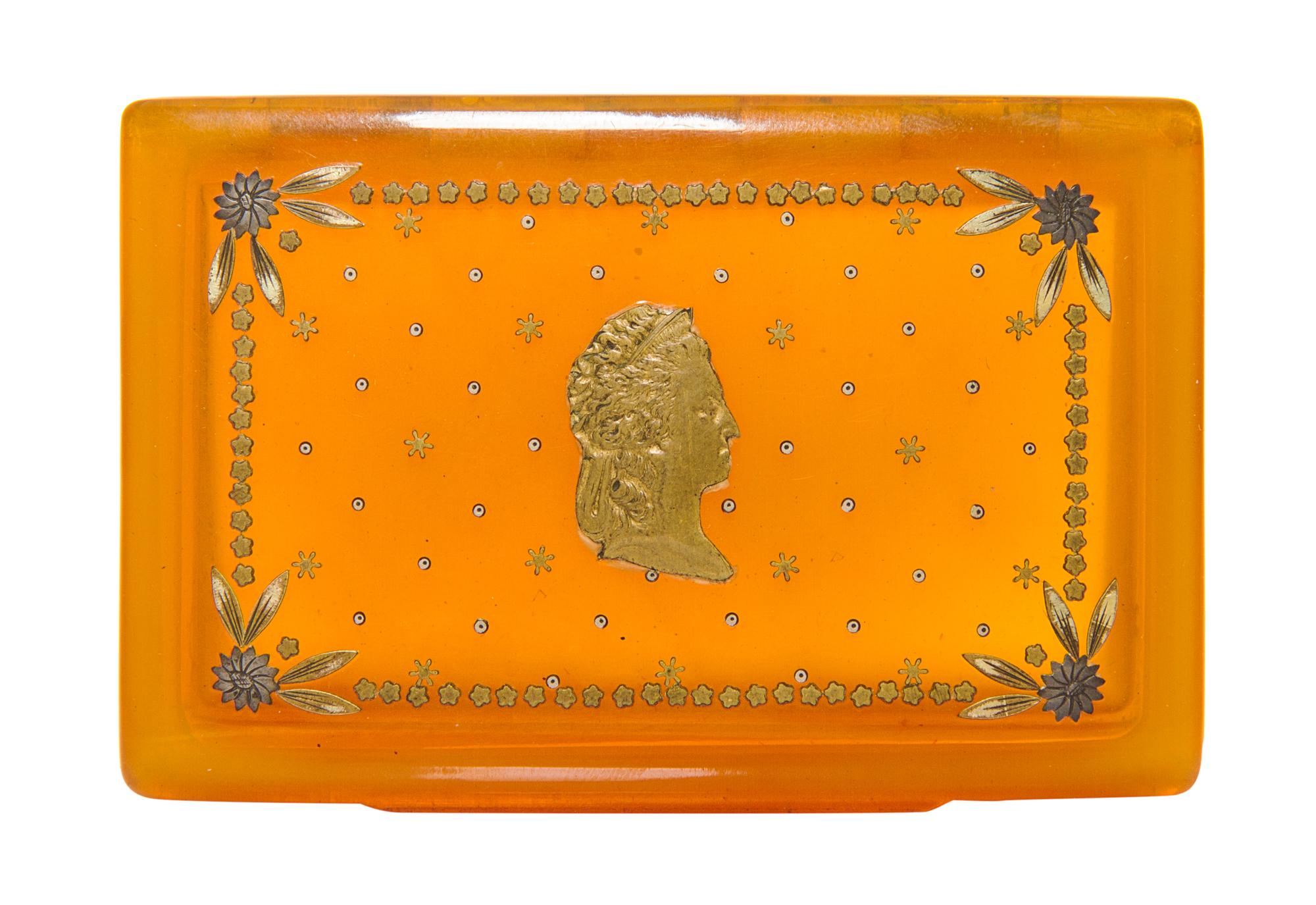 A Silver Inlaid Blond Tortoise Shell Box, 19th Century, of rectangular form, the hinged lid inset with a profile of a classical lady.
