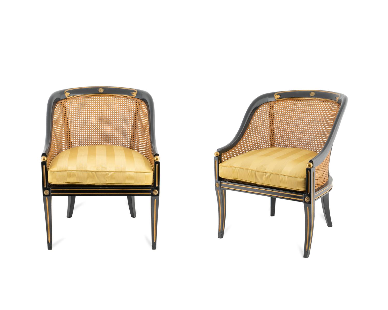 A Pair of Regency Style Parcel-Gilt, Caned and Ebonized Tub Chairs