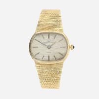 A 14K yellow gold wristwatch, Universal