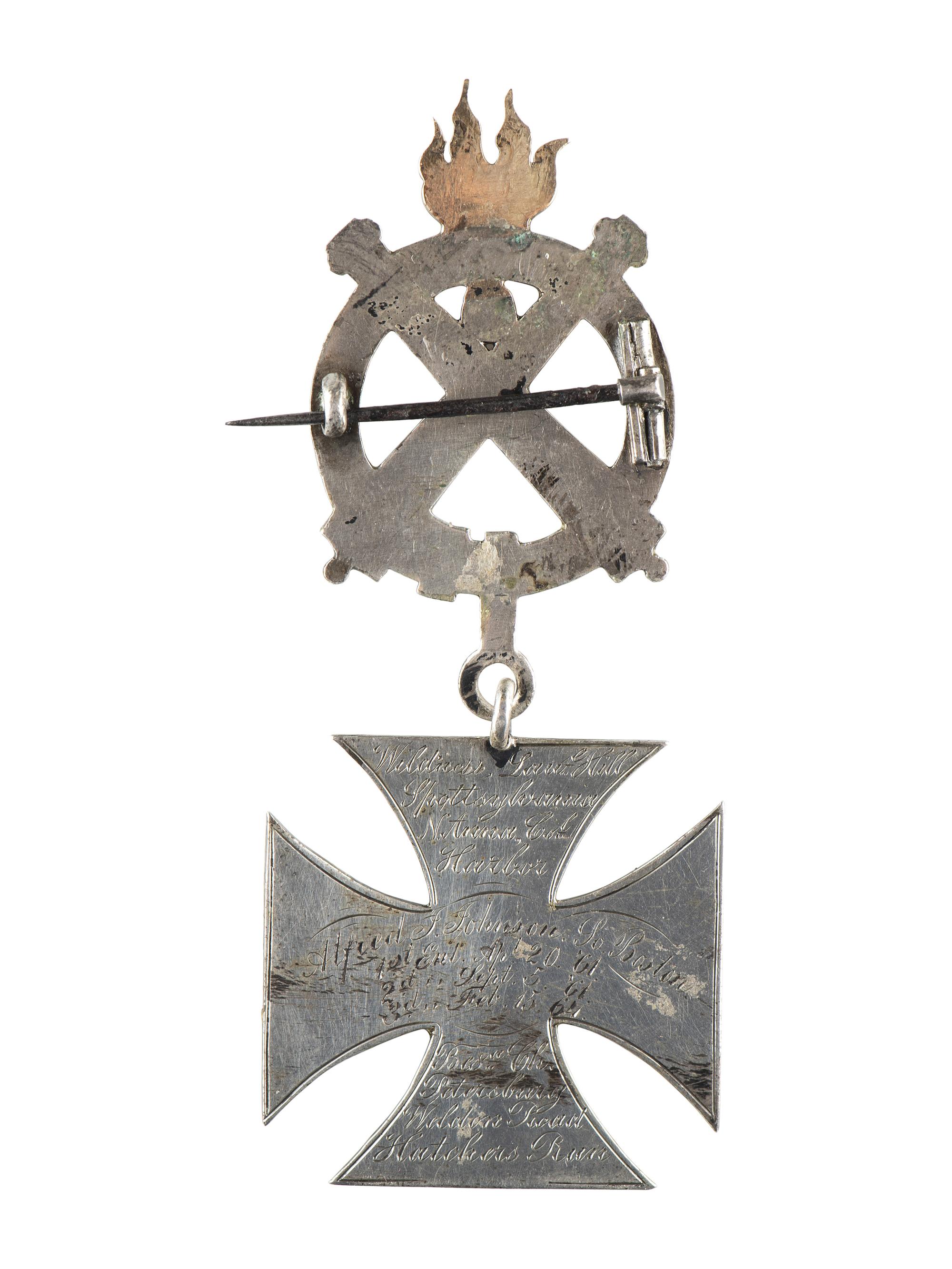 [CIVIL WAR]. Badge identified to Alfred J. Johnson, 1st, 3rd, and 5th Massachusetts Light Artilleries.