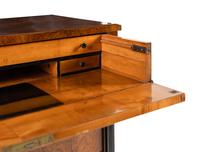 An Austrian Walnut and Part-Ebonized Bureau Commode
