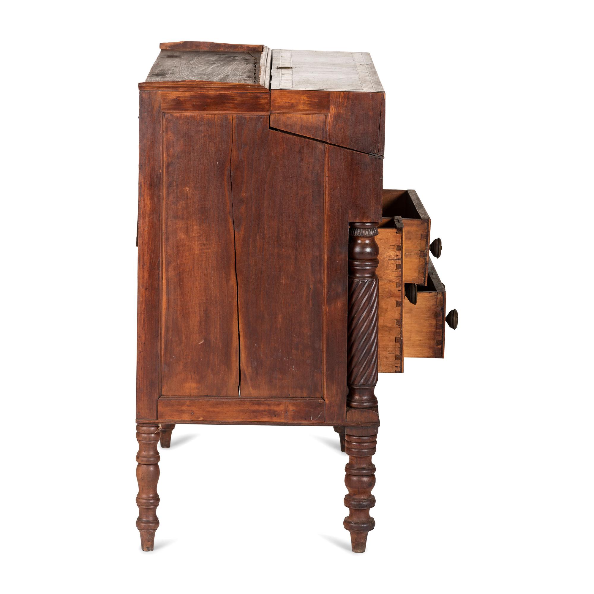 A Classical Figured Maple and Mahogany Desk-and-Bookcase