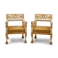 A Pair of Italian Neoclassical Style Painted and Parcel Gilt Armchairs