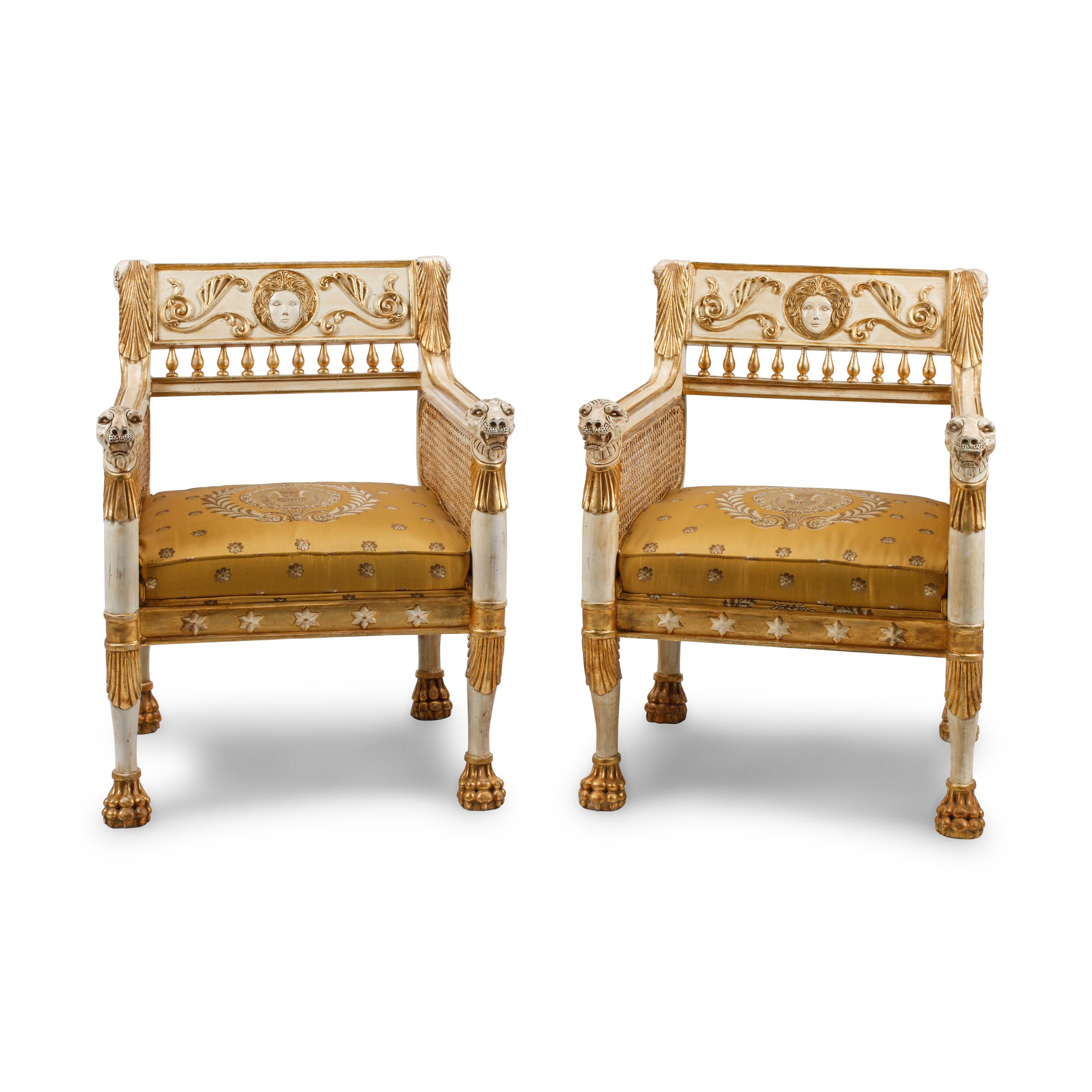 A Pair of Italian Neoclassical Style Painted and Parcel Gilt Armchairs