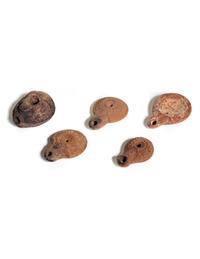 Five Roman Molded Terra Cotta Oil Lamps