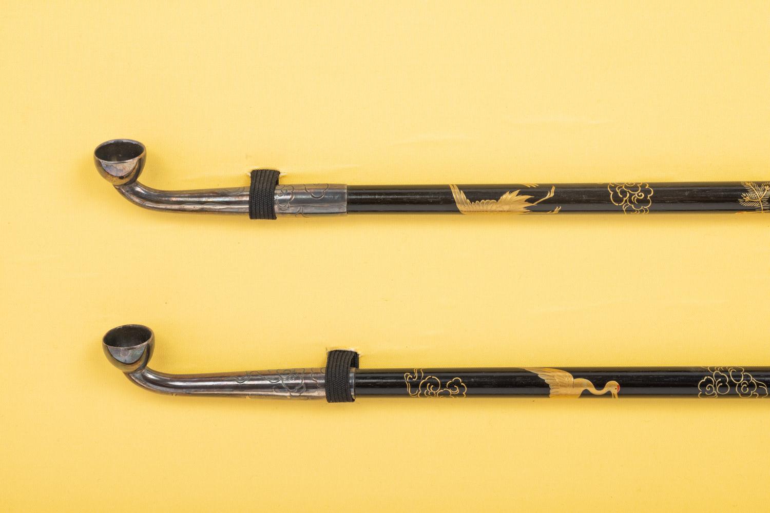 Two Japanese Silver and Lacquered Wood Pipes