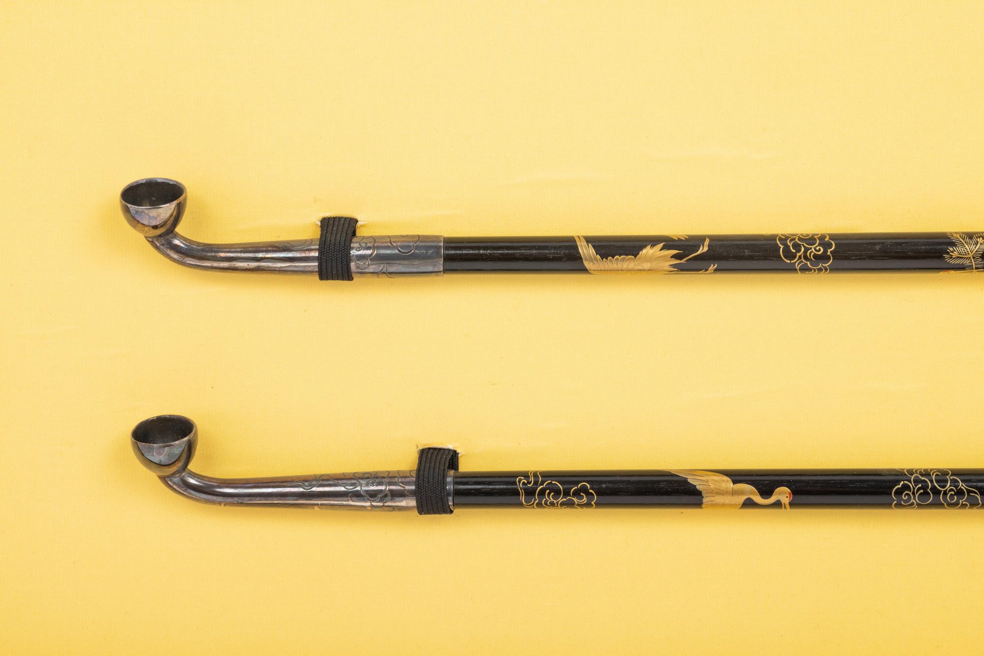 Two Japanese Silver and Lacquered Wood Pipes