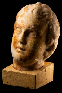 A Large Roman Marble Portrait Head of a Youth