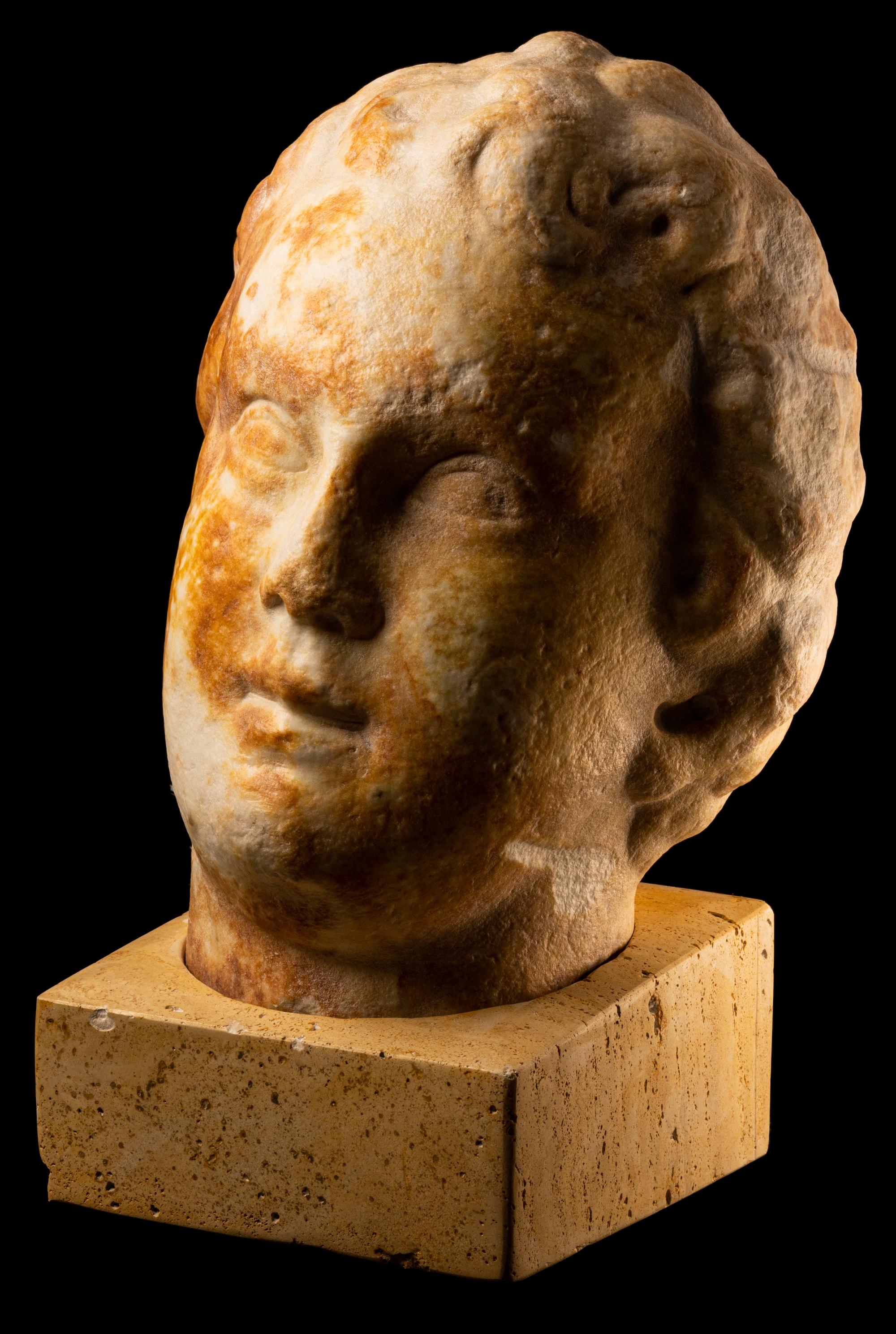 A Large Roman Marble Portrait Head of a Youth