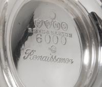 An American Silver-Plate Tea and Coffee Service, Reed & Barton, Taunton, MA, each with floral decoration.