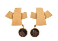 A Pair of 18 Karat Yellow Gold and Smoky Quartz Earclips,
