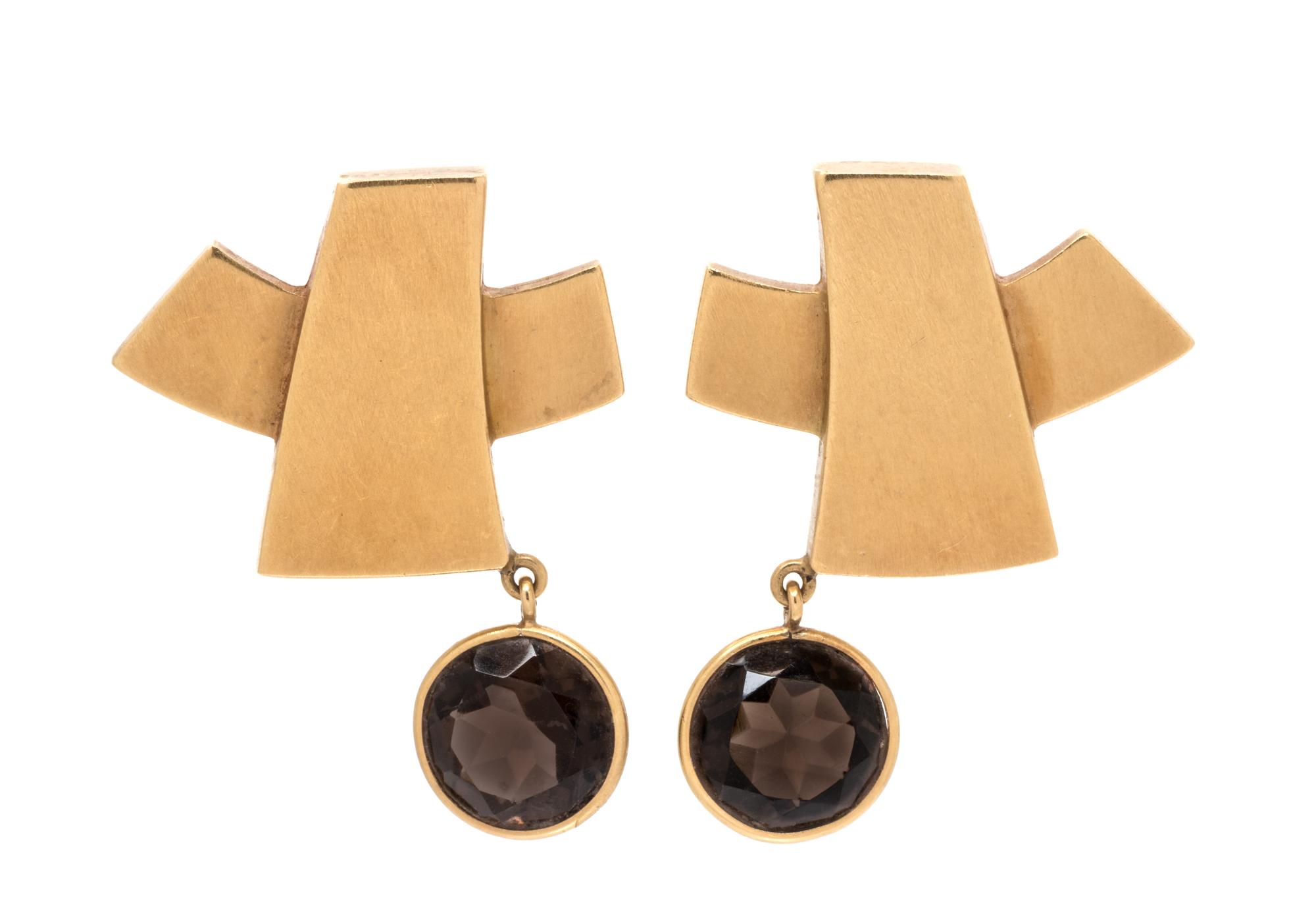 A Pair of 18 Karat Yellow Gold and Smoky Quartz Earclips,