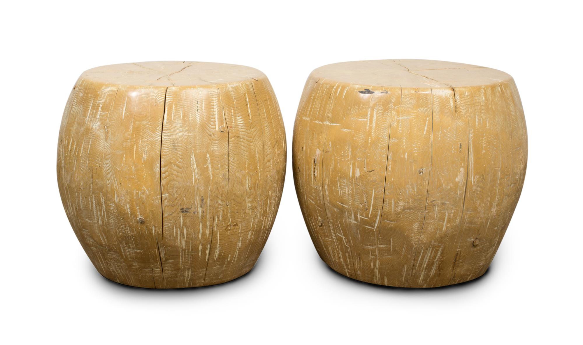 A Pair of Contemporary Barrel Form Tables Height 23 1/2 x diameter 28 inches.