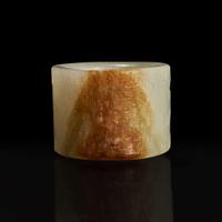 A large pale celadon and russet jade archer ring with Imperial poem and hunting scene 乾隆御题诗狩猎图玉扳指 Qing Dynasty ?