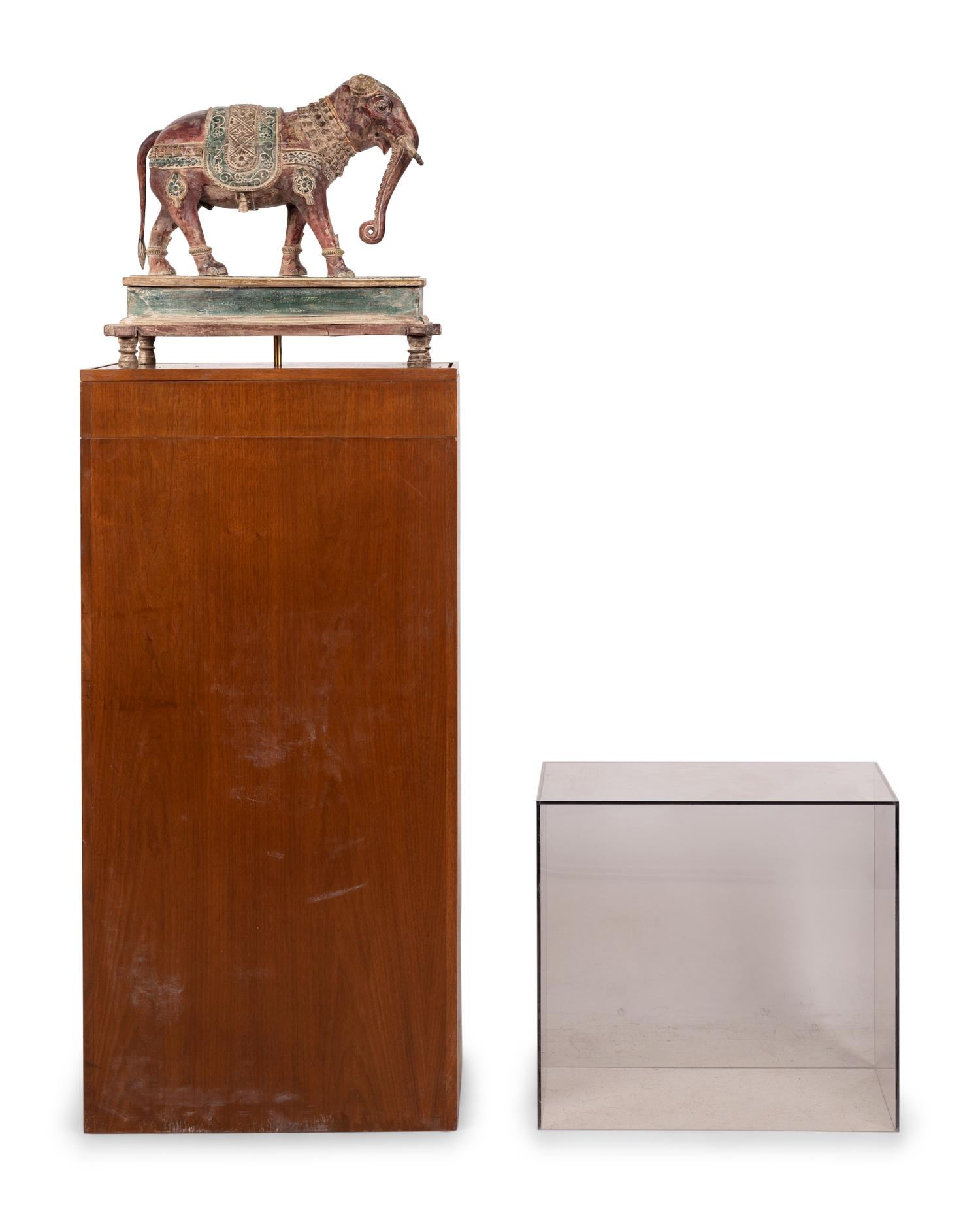An Indian Carved Wood Model of an Elephant in a Walnut and Glass Vitrine