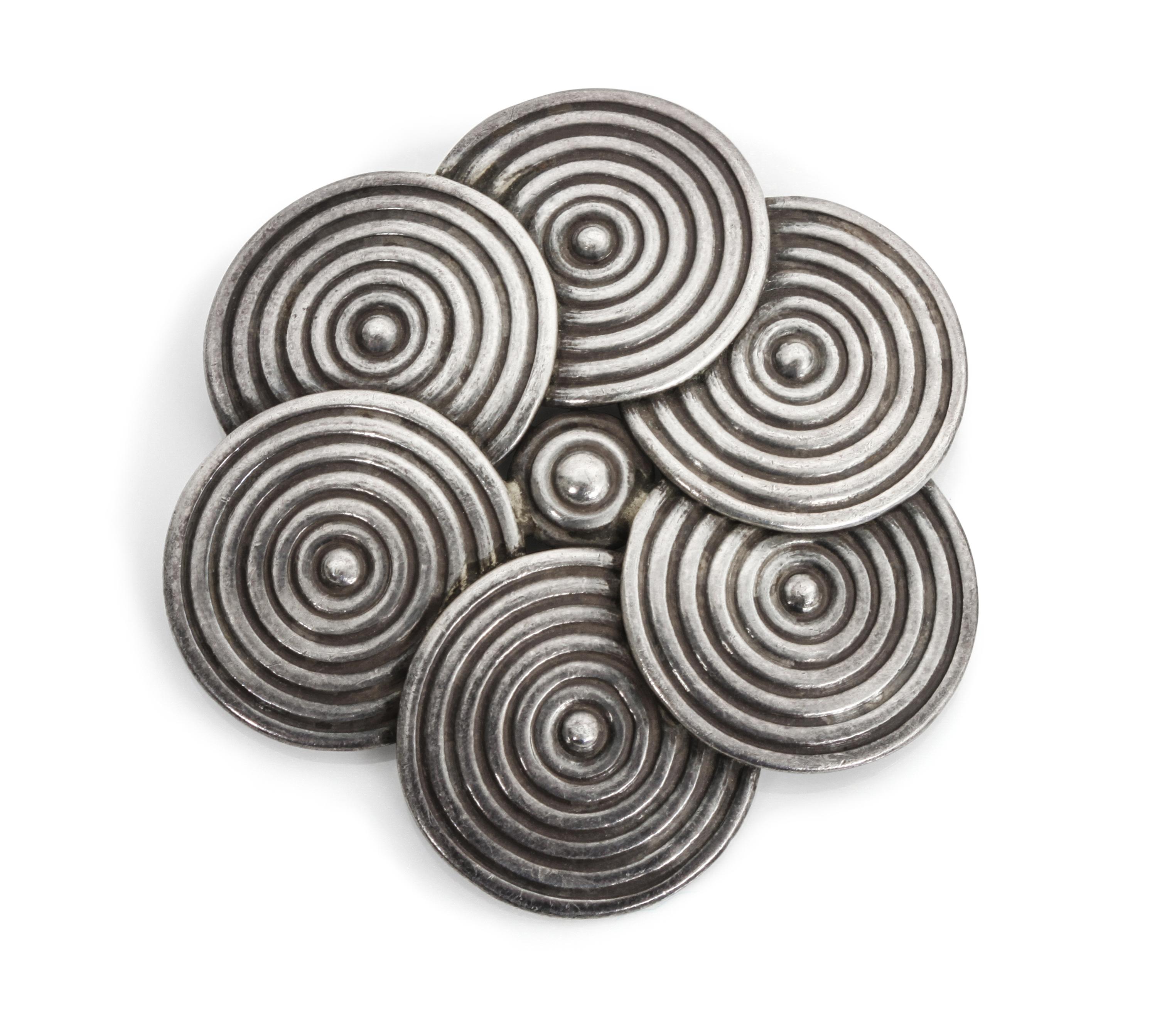 A Mexican Silver Brooch, Los Castillo Diameter 2 1/2 inches.