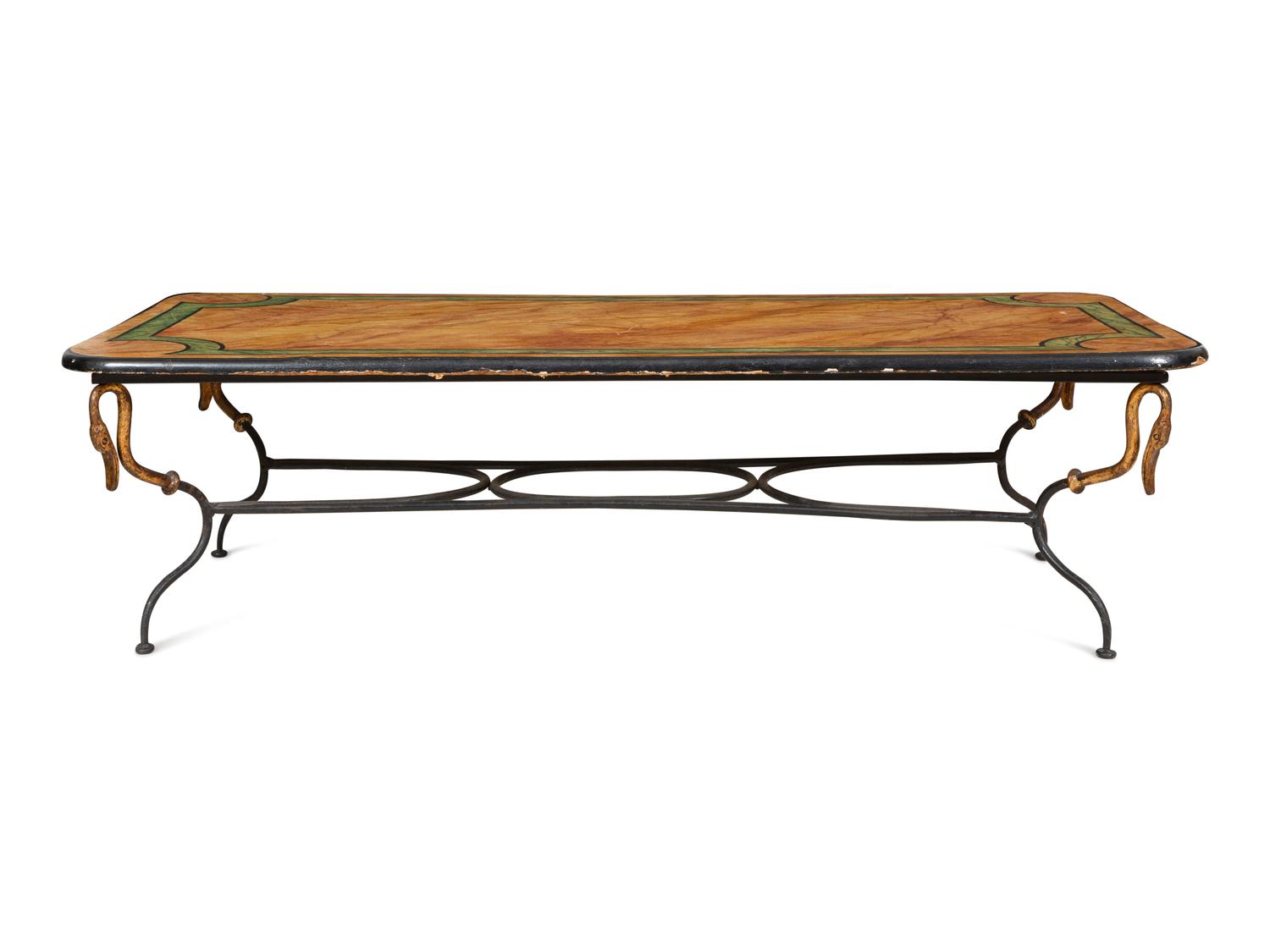 A Wrought Iron and Faux Marble Coffee Table