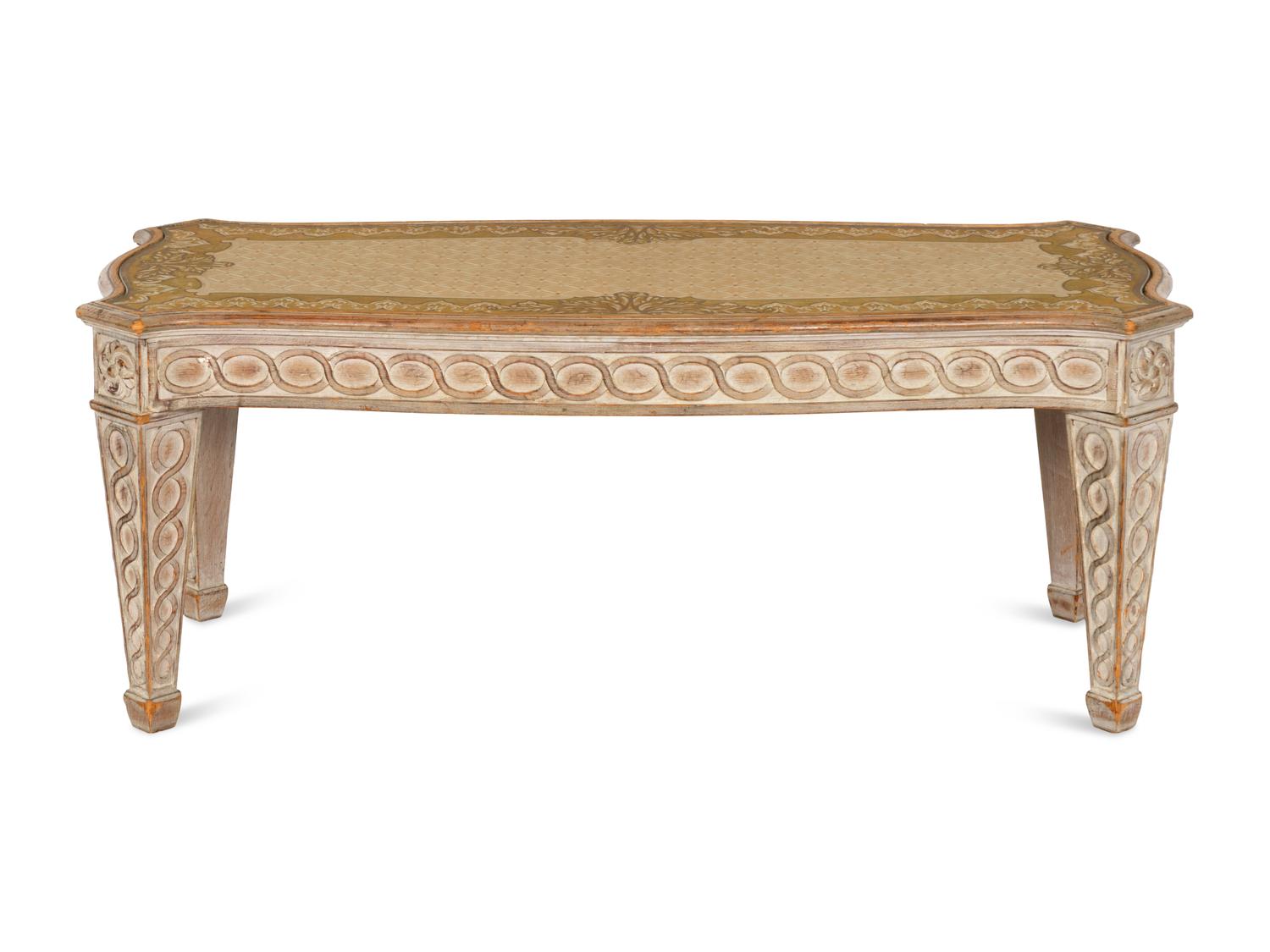 An Italian Cream-Painted and Parcel Gilt Cocktail Table