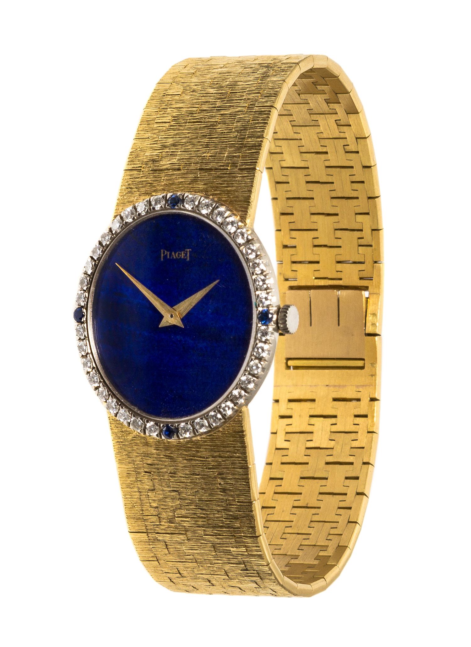 An 18 Karat Yellow Gold, Lapis Lazuli, Diamond and Sapphire Wristwatch, Piaget, 37.70 dwts.